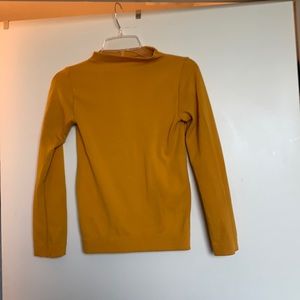 Yellow long sleeved top